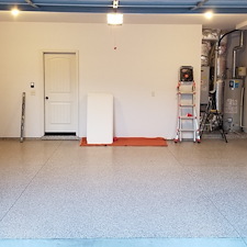 Boise Idaho Garage Upgrade: Epoxy + Polyaspartic Coating & Premium White Cabinets